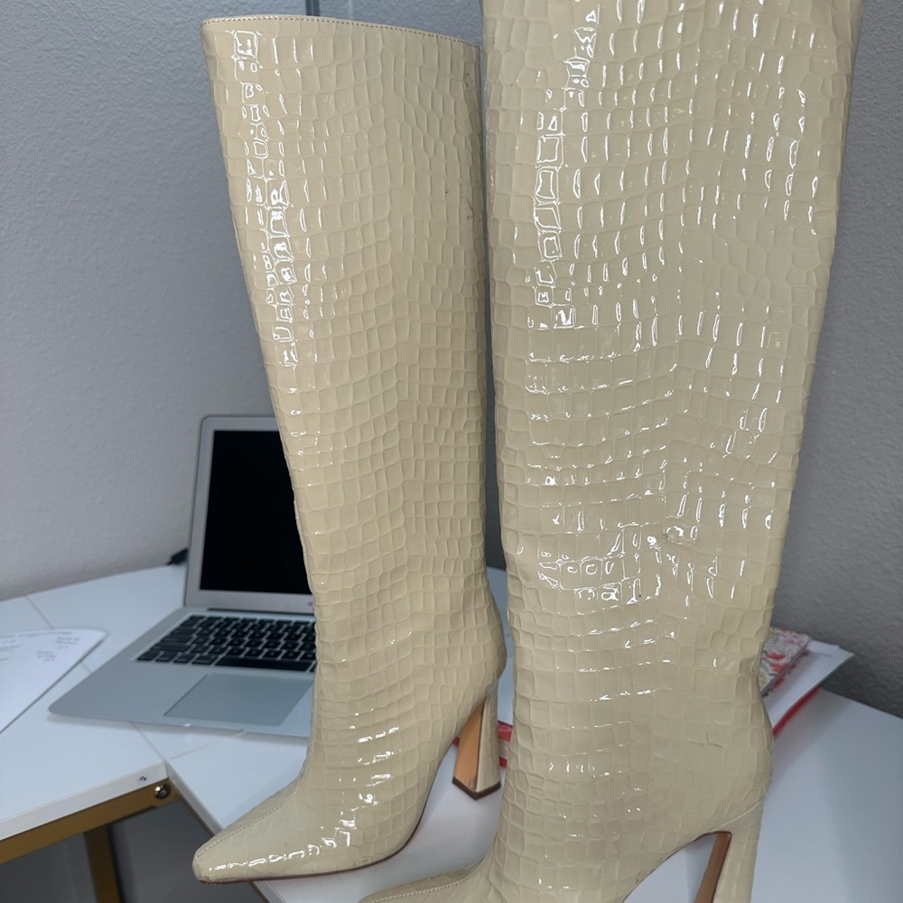 Beige knee high boots